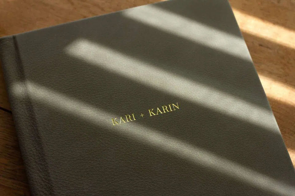 Black cover of a fine art wedding album